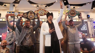 oleksandr-usyk-presser-belts.jpg
