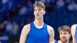 Olivier Rioux, Florida basketball's 7-foot-9 center, works out for Gators football team