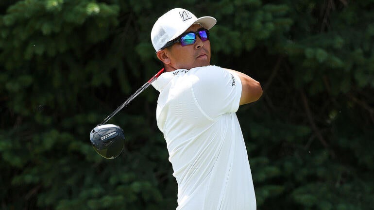 Min Woo Lee takes a swing