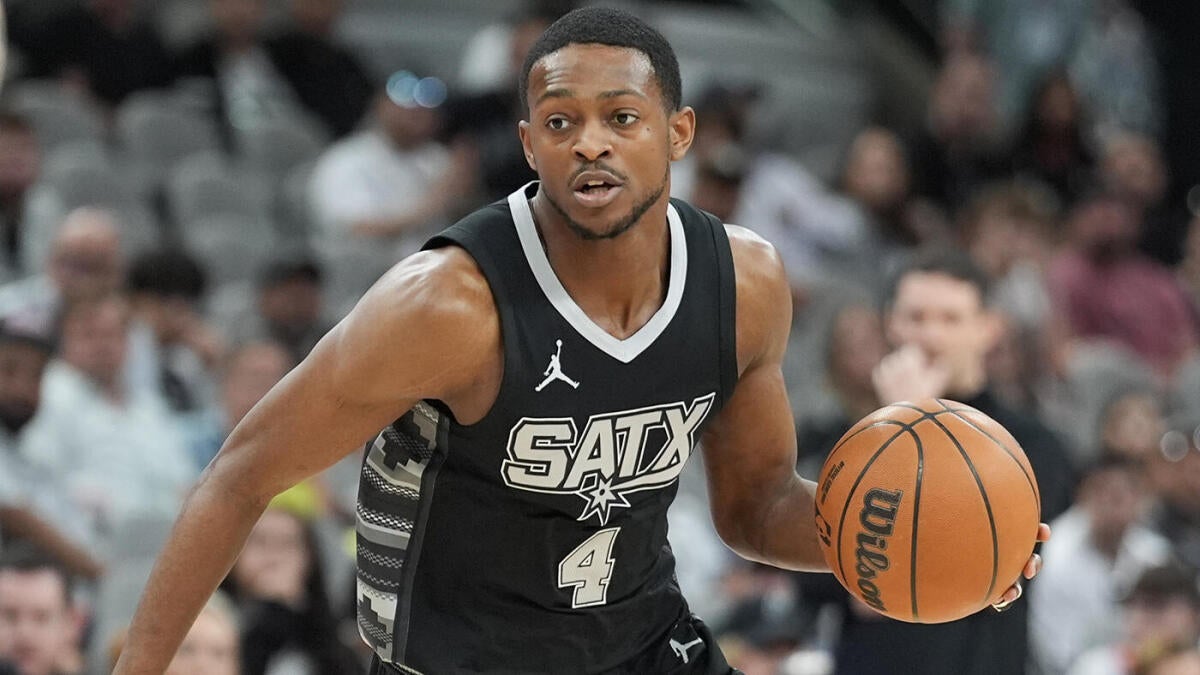 https://sportshub.cbsistatic.com/i/r/2025/08/01/b2ab1a66-cb14-4809-ba74-55870f983304/thumbnail/1200x675/0de5fc6b59db0175b0dc31d88bcf32e7/deaaron-fox-spurs-g.jpg