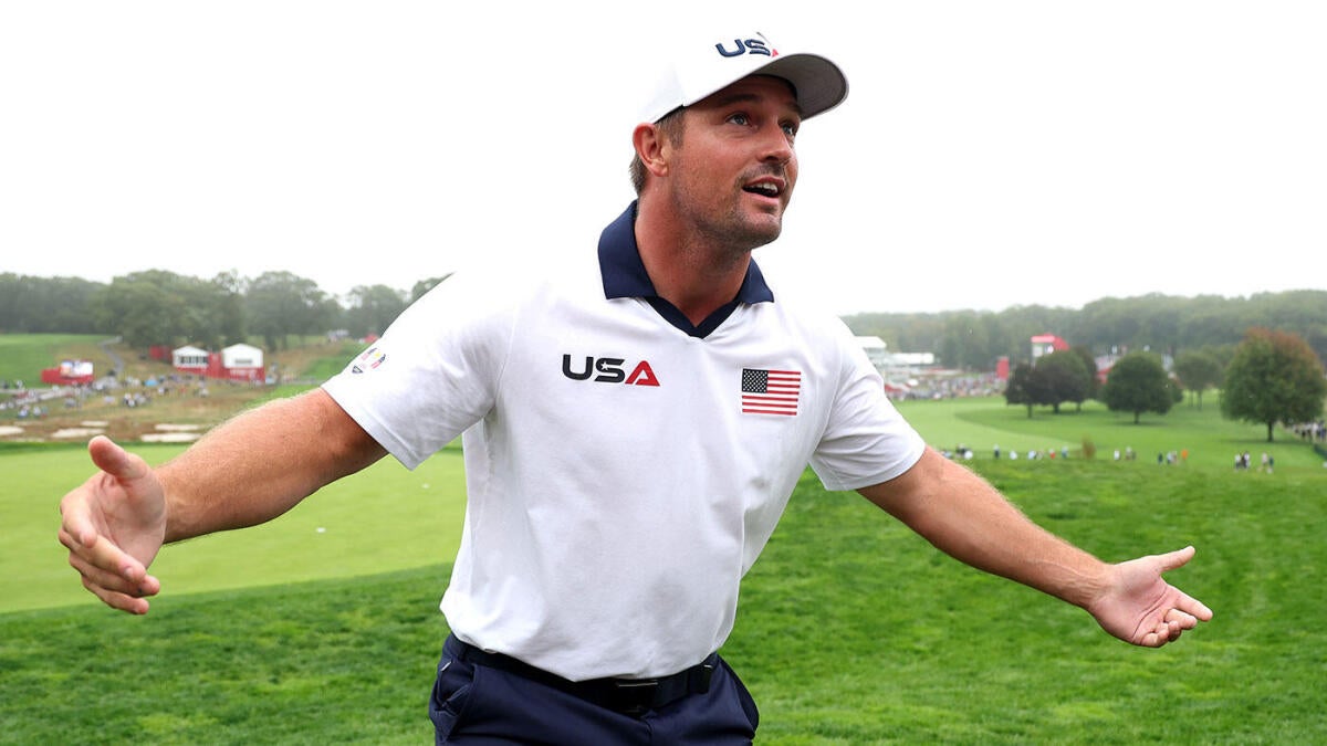 https://sportshub.cbsistatic.com/i/r/2025/09/25/c11d3646-e451-4f86-ab6f-fe384f70cb90/thumbnail/1200x675/56c02c22b822504757c44907914f54c1/bryson-dechambeau-ryder-cup-hug-g.jpg