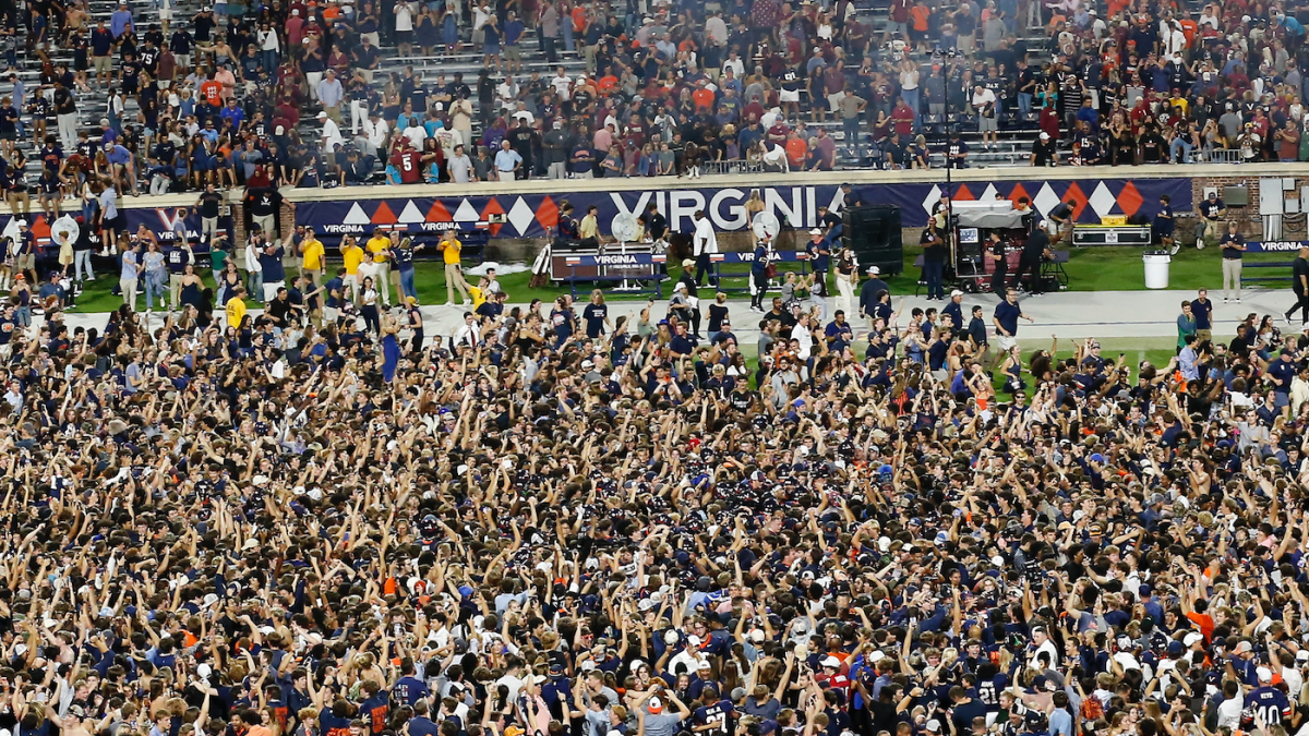Field storming after Virginia's upset win over FSU leads to 19 people being treated for injuries