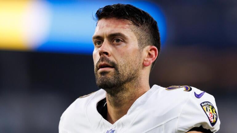 Justin Tucker comemorando um chute bem-sucedido