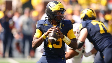Michigan QB Bryce Underwood drops back to pass in a game vs. Wisconsin
