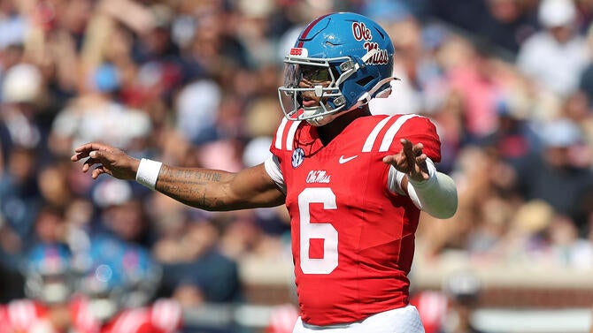 Reuben Bain Jr. em ação no College Football.