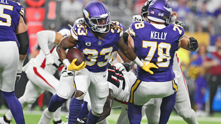 Jogadores do Minnesota Vikings em campo