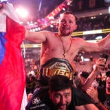 petr-yan-belt-flag-celebrate-323.jpg
