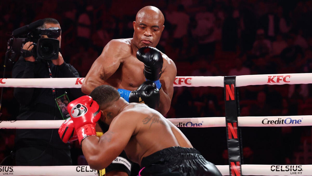 Anderson Silva, 50, knocks out fellow MMA legend Tyron Woodley on Jake Paul vs. Anthony Joshua undercard