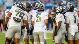 Tom Fornelli's College Football Playoff betting guide: CFP semifinal picks for Miami-Ole Miss, Indiana-Oregon