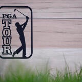 pga-tour-logo-wood-grass-sign.jpg