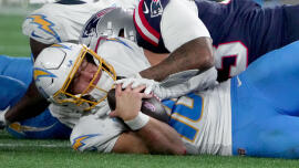 Justin Herbert still hasn't won a playoff game. How much is his fault, and how can the Chargers change that?