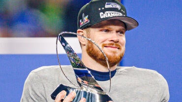 getty-sam-darnold-seahawks-trophy.jpg