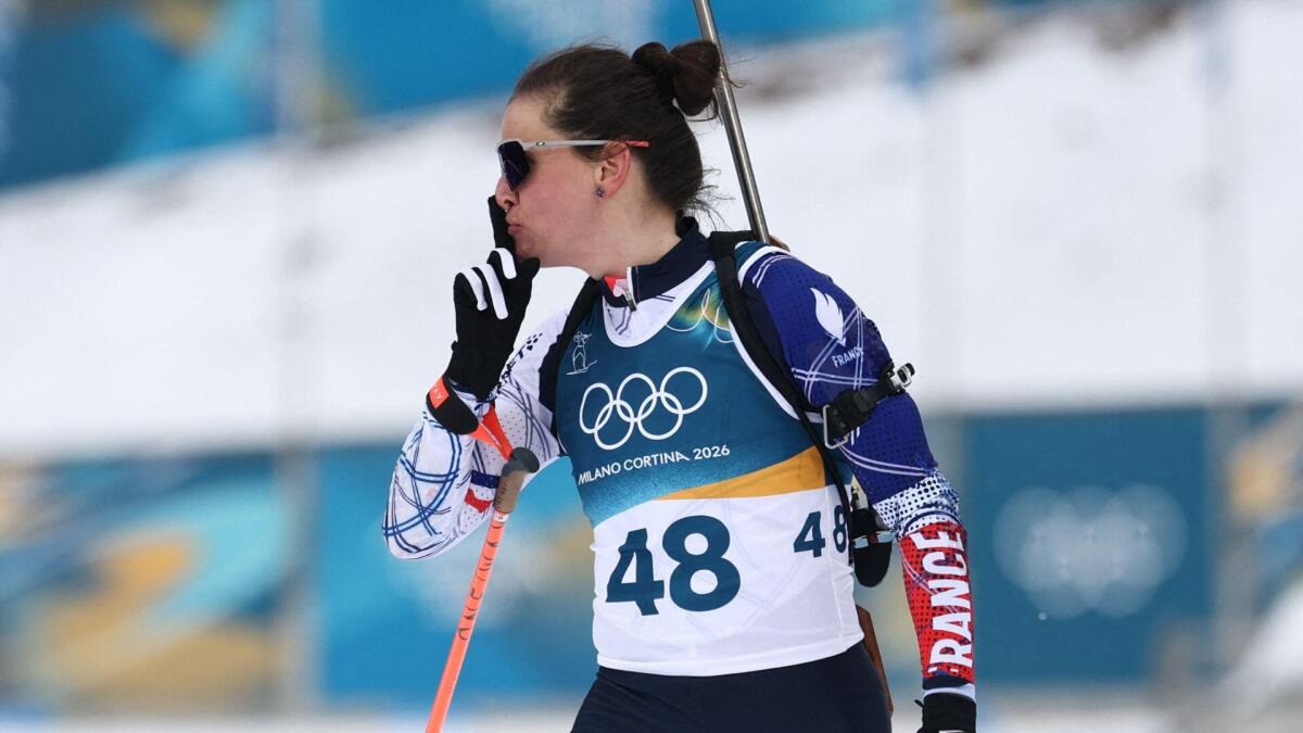 French biathlon star wins Olympic gold medal after credit card fraud case