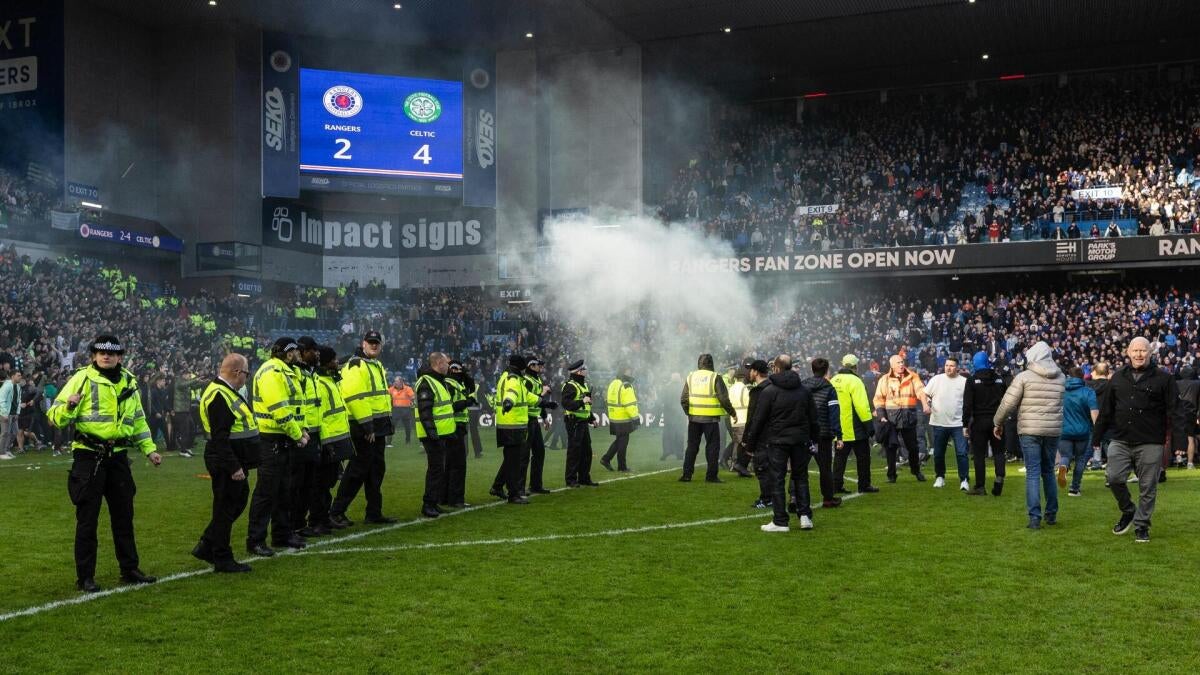Old Firm fury: Celtic victory over Rangers sparks pitch invasion at Ibrox after heated Scottish Cup tie