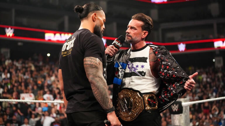 cm-punk-roman-reigns-wwe-raw-getty.jpg
