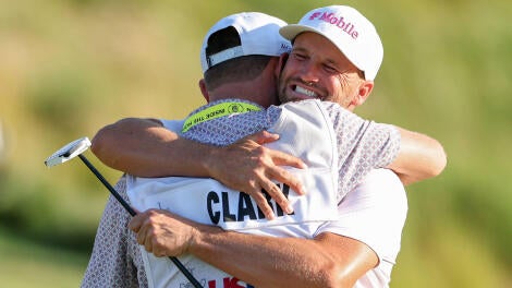 wyndham-clark-caddie-hug.jpg