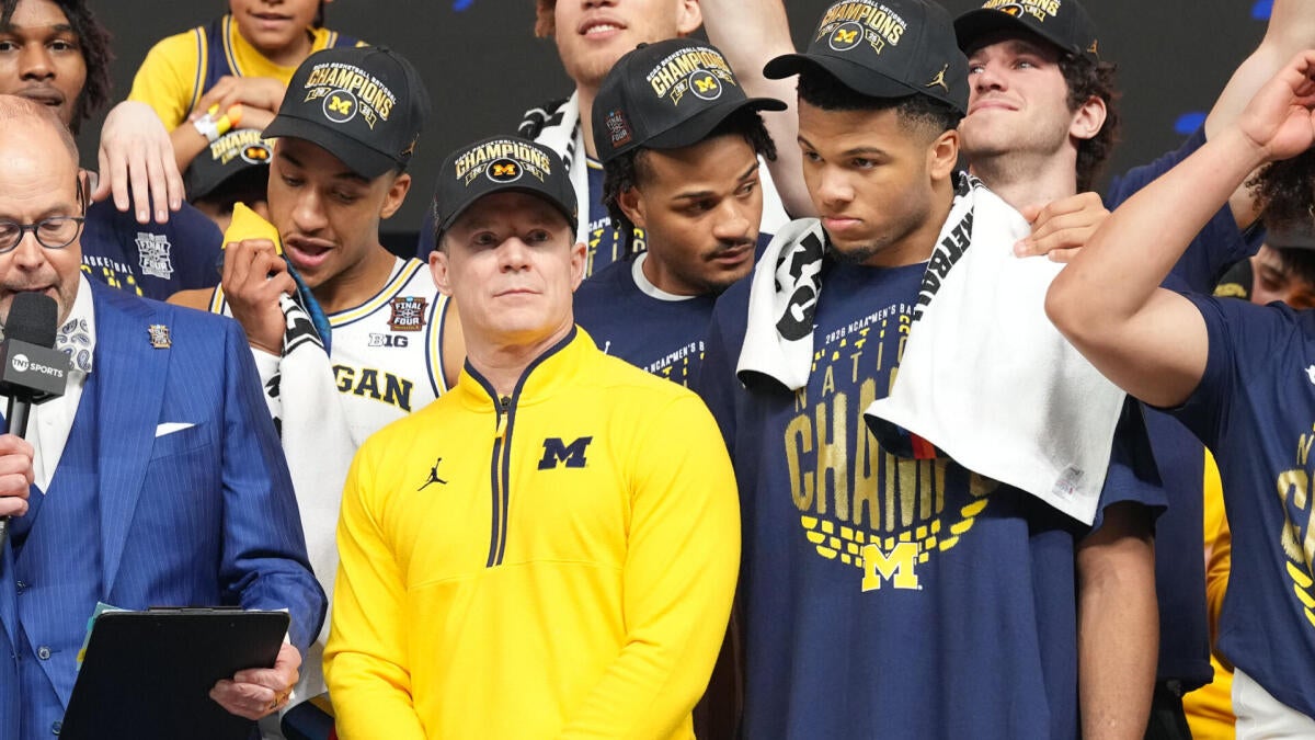 Mavs hire Michigan's Dusty May after NCAA championship