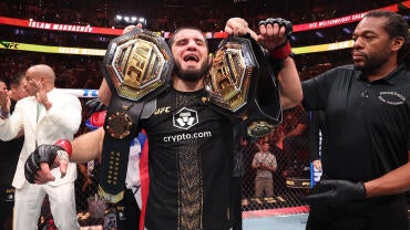 islam-makhachev-belts-330-smile.jpg