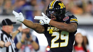 Missouri Tigers running back Ahmad Hardy (29) reacts to his first down pickup during the first quarter of the TaxSlayer Gator