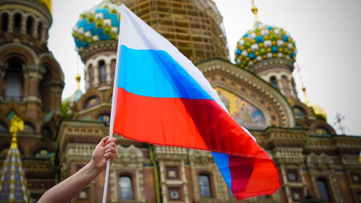 IOC Lifts Ban on Russia, Raising Questions for FIFA and UEFA