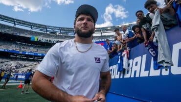 New York Giants running back Cam Skattebo (44) signs autographs following a 10-13 loss to Minnesota Vikings during a preseason