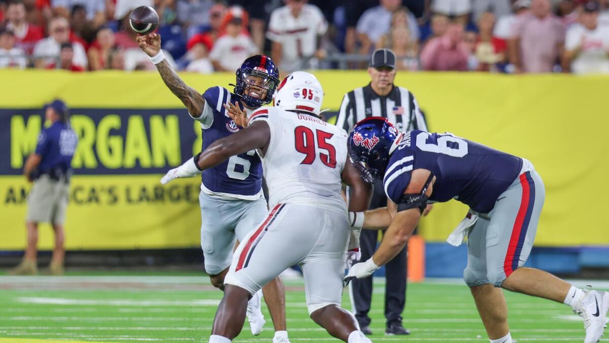 No. 9 Ole Miss escapes No. 24 Louisville's late surge with walk-off FG