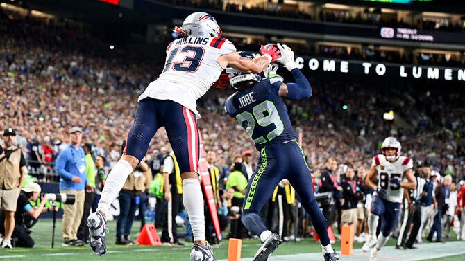 Josh Jobe intercepts a ball in front of Patriots receiver Mack Hollins