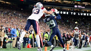 Josh Jobe intercepts a ball in front of Patriots receiver Mack Hollins