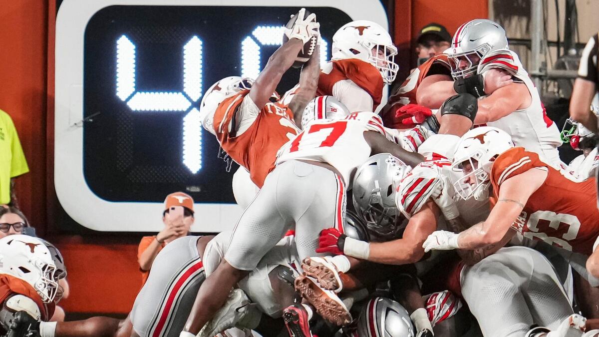 No. 4 Texas storms back late to stun No. 1 Ohio State in Austin College Football
