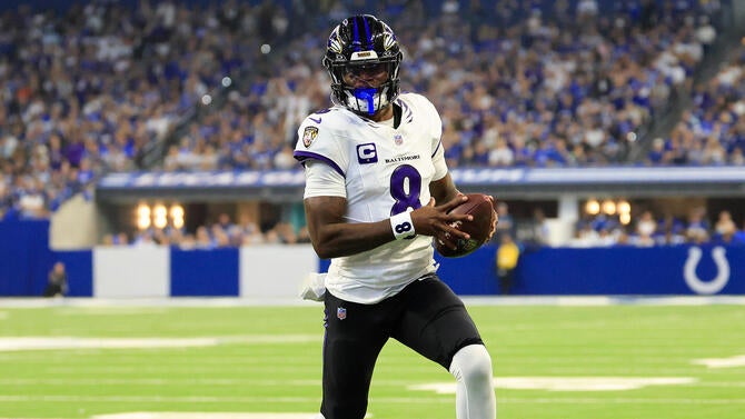 Number 8 Lamar Jackson runs into the endzone carrying the football during Week 1's opener.