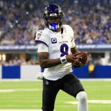 Number 8 Lamar Jackson runs into the endzone carrying the football during Week 1's opener.