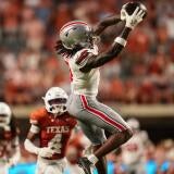 Ohio State Buckeyes wide receiver Jeremiah Smith (4) catches a pass during the NCAA football game against the Texas Longhorns at