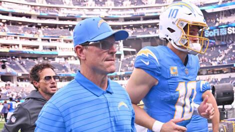 getty-jim-harbaugh-justin-herbert-chargers.jpg