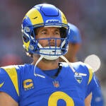 Matthew Stafford, in a blue Rams jersey, stares off into the distance during the opener against the 49ers.