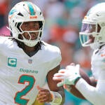 imagn-malik-willis-devon-achane-dolphins.jpg