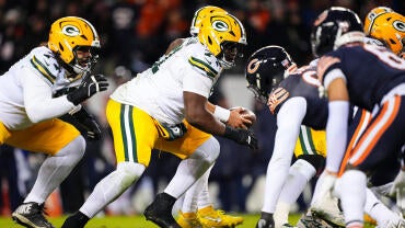 The Green Bay Packers line up against the Chicago Bears across the line of scrimmage during a 2025 football game.