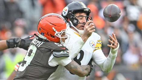 getty-grant-delpit-aaron-rodgers.jpg
