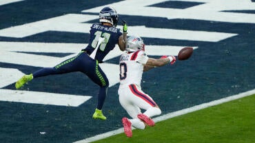 Patriots Christian Gonzalez breaks up a pass against Jaxon Smith-Njigba during Super Bowl LX.