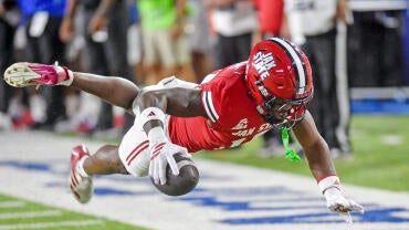 2026-09-27t011640z-921784746-mt1usatoday29927172-rtrmadp-3-jax-state-wide-receiver-jamill-williams-dives-for-extra-1.jpg