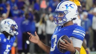 Kentuckyís Kenny Minchey runs in the 2 point conversion to win the game against LSU at Kroger Field Saturday evening.
Oct. 10,