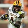 Kennesaw State wide receiver Zion Booker (4) carries the ball during a college football game against Tennessee on Sept. 19,