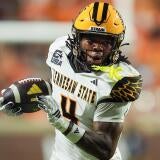 Kennesaw State wide receiver Zion Booker (4) carries the ball during a college football game against Tennessee on Sept. 19,