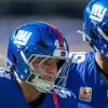 New York Giants quarterback Jameis Winston (19) and New York Giants running back Cam Skattebo (44) warm up together during a