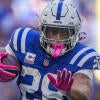 Indianapolis Colts running back Jonathan Taylor (28) takes off on a run Sunday, Oct. 18, 2026, during the game against the