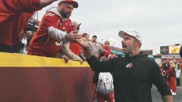 Utah head coach Morgan Scalley celebrates with fans after Utahís 31-17 victory over Iowa State on Sept. 26, 2026, at Jack Trice