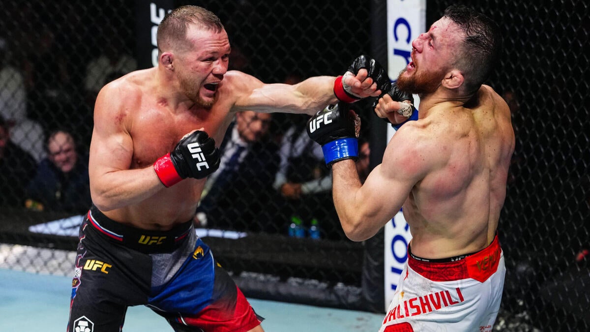 Yan beats Dvalishvili 48-47 on all cards; third-round scoring draws debate