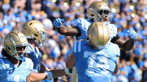 Feature and action photos of UCLA football hosting Michigan State, 12:30 pm start