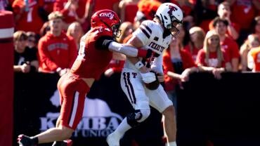 Cincinnati Bearcats edge rusher Patrick Bauer (10) sacks Texas Tech Red Raiders quarterback Will Hammond (15) in the second